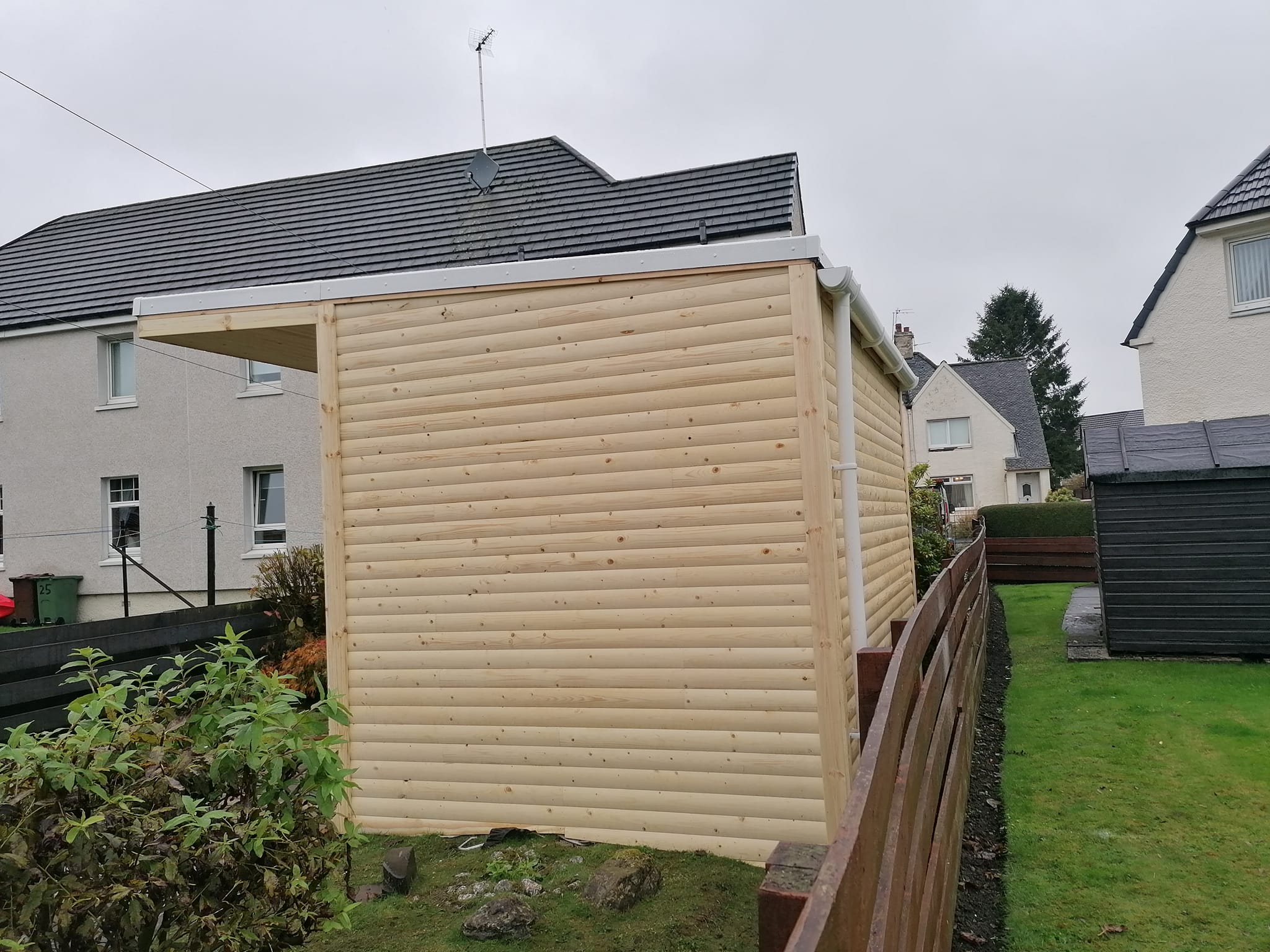 Completed summer house with French doors and deck